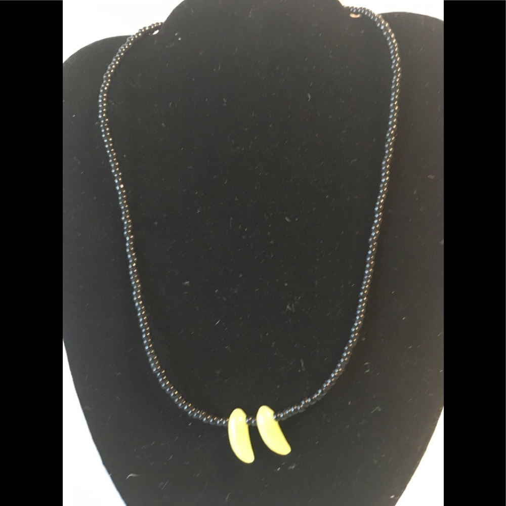 Yellow glass beads and small black beaded necklace